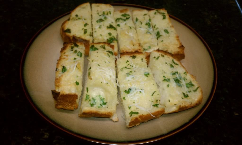 Paula Deen’s Zesty Roasted Garlic Bread she cooks, he eats
